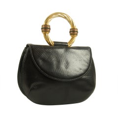 Judith Leiber Black Kaurng, Onyx 
Garnet Bracelet Bag