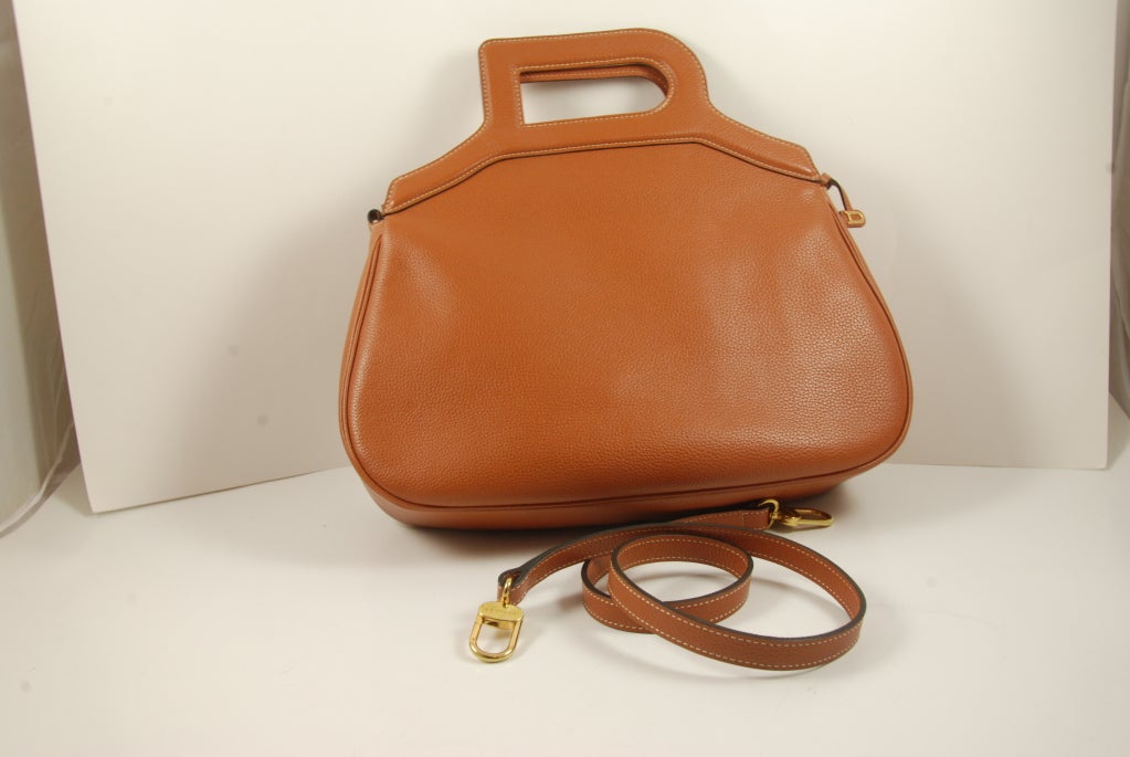 Cognac colored leather bag by the Brussels leather goods firm Delvaux.  Handles are in a 