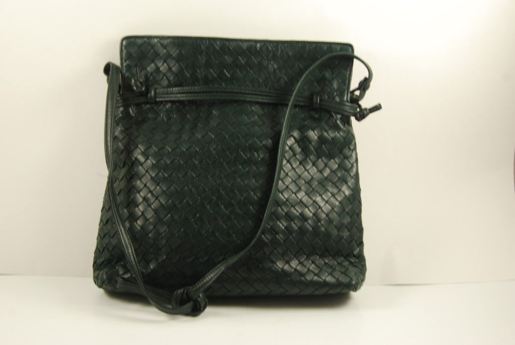 Vintage Bottega Veneta nappa Intrecciato bag in fabulous condition. Bag was purchased in the 1980s and never used. There is a pin snap on the inside and a pull string that can be tightened or not. Shoulder strap is long enough to be used as a cross