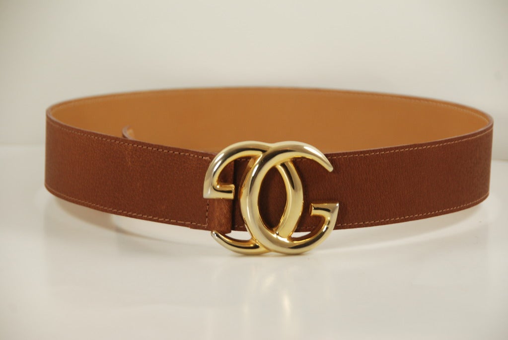 Gucci belt in iconic Gucci light brown leather. This belt was purchased by me with the original Gucci leather attached but the leather was all worn out and useless. I had my leather person make me an identical copy of the original leather strap. The