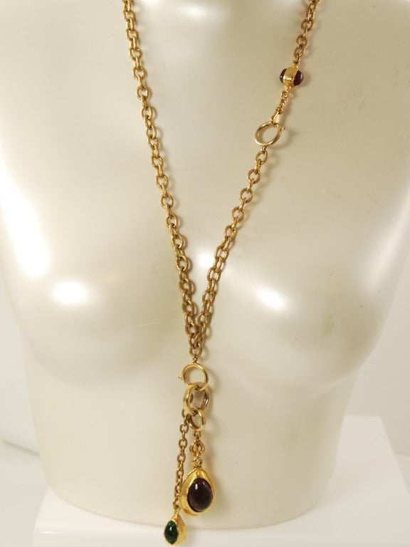 Chanel necklace from the late 1970s or early 1980s. The long neck chain has a swivel hook and spring ring decorative closure that lays on the side. This type of closure gives the wearer many options for how to style the necklace. Additionally the