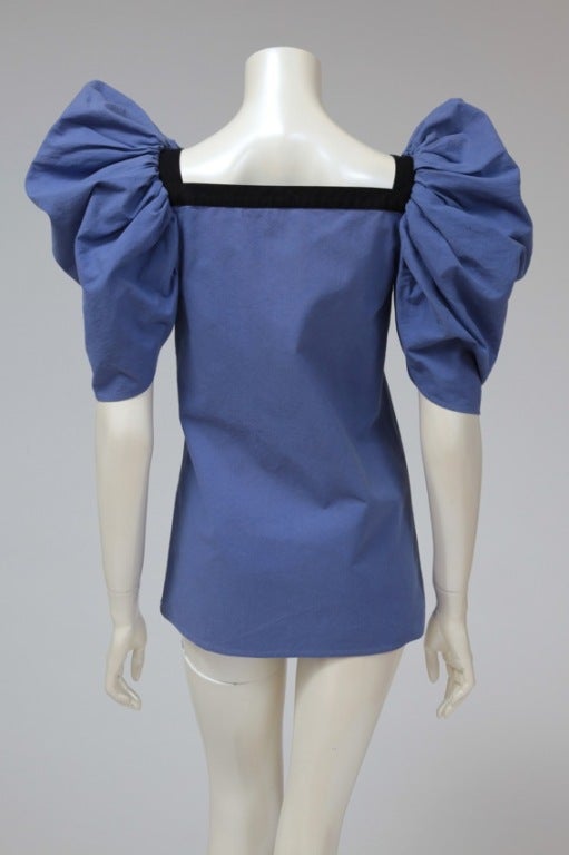 Late 70's - early 80's Yves Saint Laurent cotton tunic with exaggerated puff sleeves. Square neckline. An unusual and rare YSL piece ! 

Fits approx. : US 2-4 / FR 36
Note : this style runs small to size underarms. 

Measurements (taken flat)
