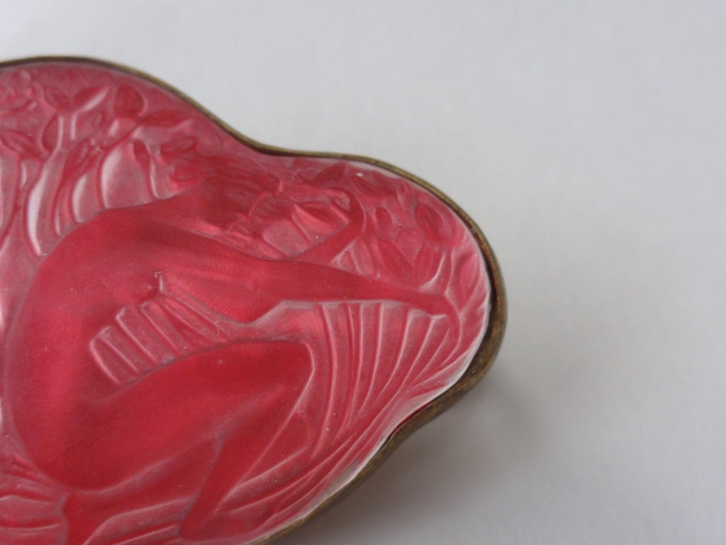 Frosted glass with red foil mounted in brass base
stamped Lalique
model 1388 in Felix Marcilhac Cataloge Raisonne
Circa 1913