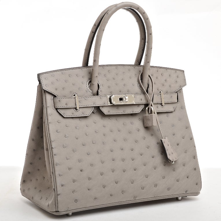 Hermes Gris Tourterelle Ostrich Birkin 30cm with tonal stitching, palladium hardware, front toggle closure, and clochette with lock and two keys, double rolled handles, Gris Tourterelle chevre lining with one zip pocket with Hermes engraved pull and
