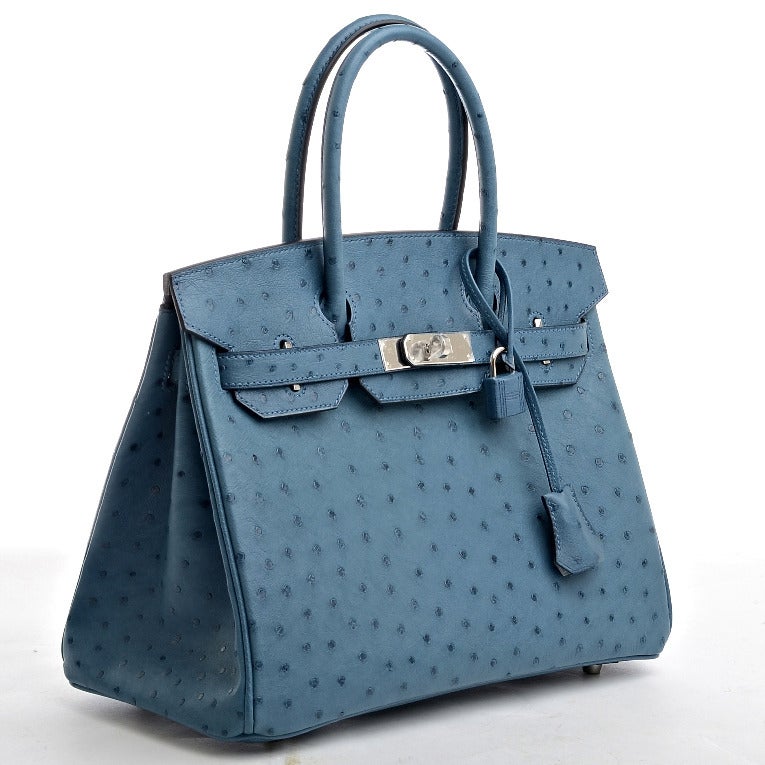 Hermes Cobalt Ostrich leather Birkin 30cm with tonal stitching, palladium hardware, front toggle closure, and clochette with lock and two keys, double rolled handles, Cobalt chevre lining with one zip pocket with Hermes engraved pull and open pocket