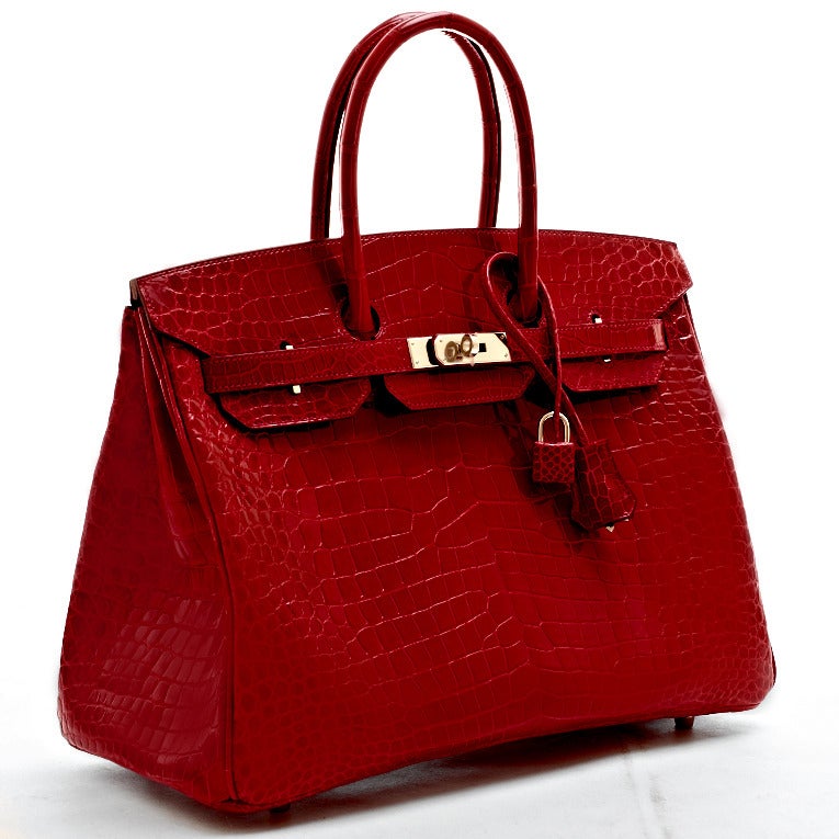 Hermes Braise shiny porosus crocodile Birkin 35cm with tonal stitching, palladium hardware, front toggle closure, clochette with lock and two keys, double rolled handles and Braise chevre lining with one zip pocket with Hermes engraved pull and open