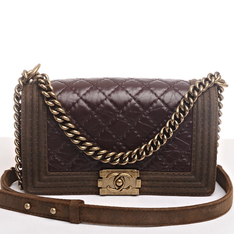 Chanel burgundy quilted glazed distressed calfskin leather Boy flap bag with antiqued goldtone hardware, brown suede leather trim on border and base, front flap with CC push lock closure and antiqued goldtone chain link and brown leather padded
