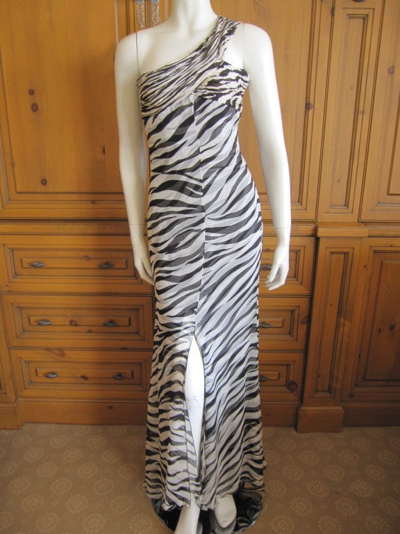 Valentino silk chiffon one shoulder dress.
With tags
two layers of sheer silk chiffon in zebra print
 Inner boned corset
sz 6
Bust 34