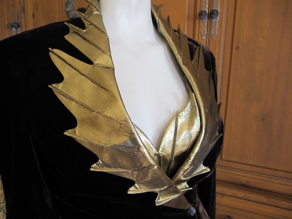 Thierry Mugler vintage Flame suit gold and brown sz 38
Lush brown velvet with gold lame flame accents
The jacket and wrap skirt are lined in gold.  
Jacket;
Bust 38