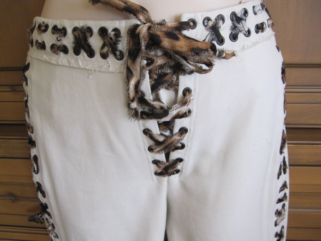 Yves Saint Laurent by Tom Ford iconic leopard  lace up trousers 

from the spring 2002 Mombasa collection
rare and collectable 

sz 34



Measurements: Waist 28