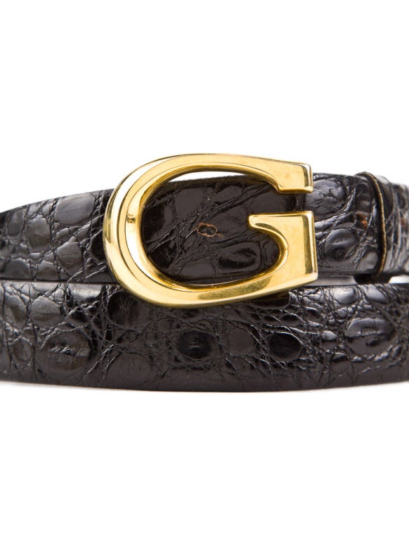Wonderful vintage Gucci Alligator belt with Gold G buckle  

The belt is marked 46, fits  38