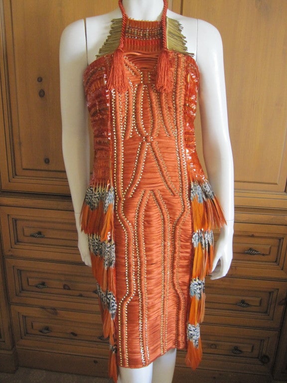 Gucci Orange Feather Runway dress Spring 2011 sz 42 NWT

 Gucci amazing runway feathered dress from the Spring 2011 collection NWT $15,000

This is a work of art, words can't describe it's beauty



This is marked sz 42

Measurements: Bust