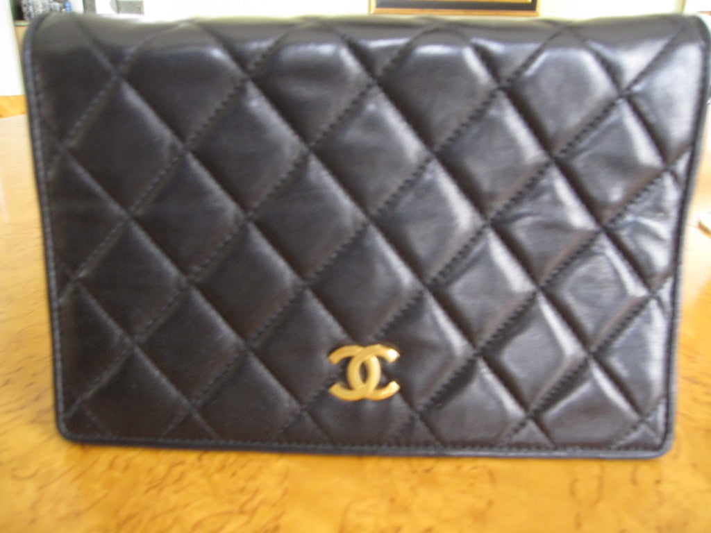 Women's Chanel small quilted black lambskin bag with 6 chain strap