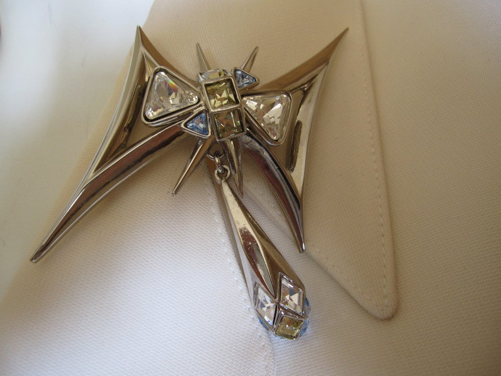 Thierry Mugler crisp white suit with four bold jewels 2