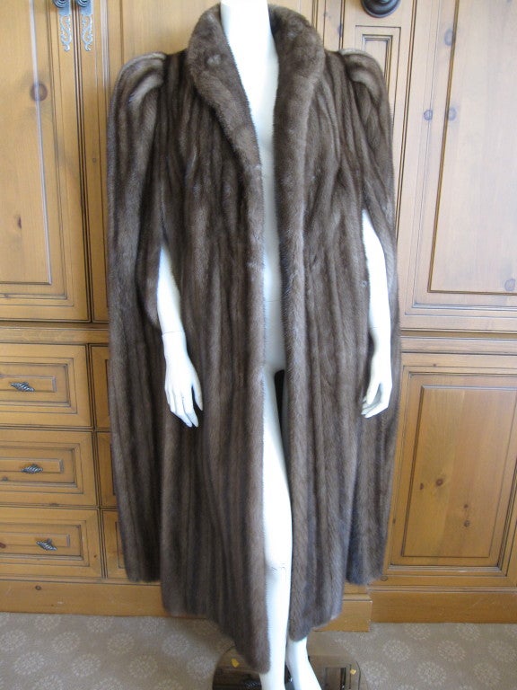 Christian Dior full length mink cape.
This is a wonderful Dior, with dramatic princess shoulders.
Length 47