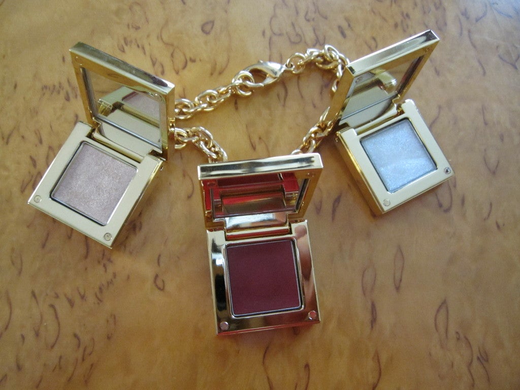 Yves Saint Laurent charm/compact bracelet  New in Box 1