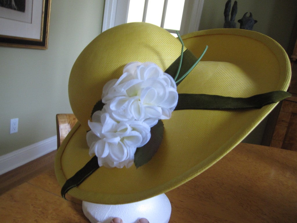Fortnum and Mason wide brim yellow straw hat by Phillip Somerville