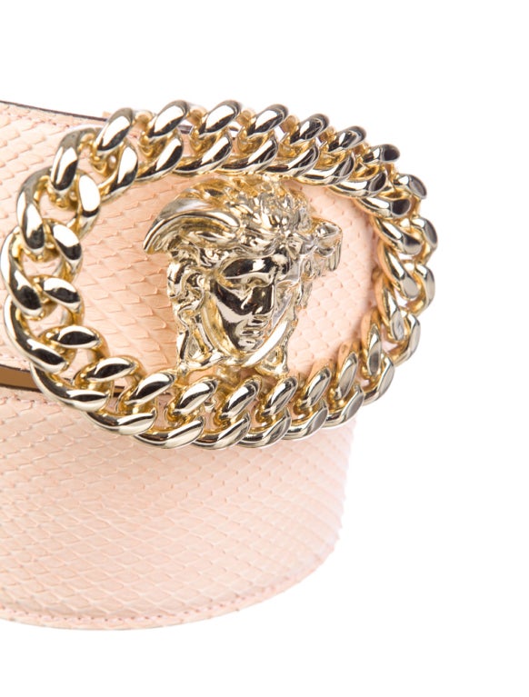 Gianni Versace wide snakeskin belt with large Medusa head buckle.Never worn, new condition.
Buckle measures 4
