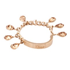 Christian Dior gold ID bracelet with Swarovski topaz "charms"