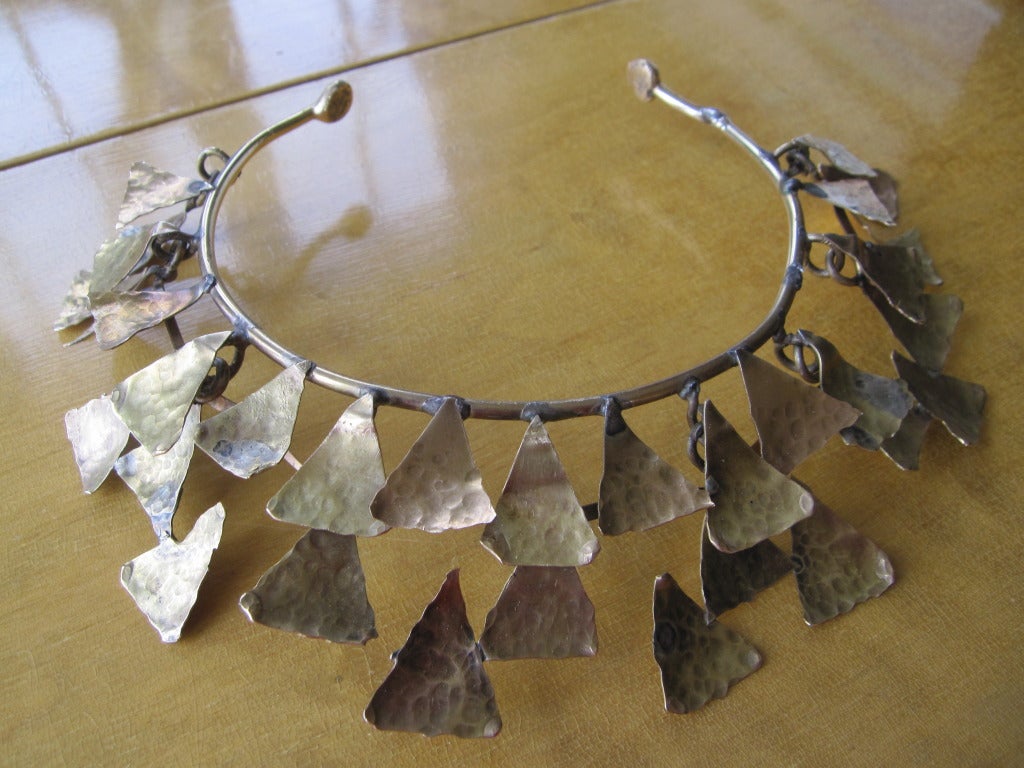 Xavier Gonzalez (1898-1993), Parcel Gilt Choker Necklace with Tiered Repousse Triangles
Xavier Gonzalez (1898-1993) was a Spanish American artist who was born in Spain and immigrated to the United States in 1925. Primarily a painter, he also was a