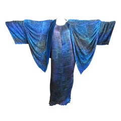 Patricia Lester Ombre pleated beaded dress
Velvet cocoon coat Patricia Lester Ombre pleated beaded dress
Velvet cocoon coat