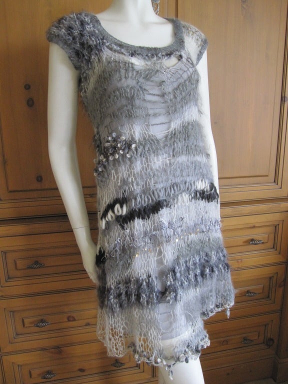 Rodarte Cobweb dress Fall 2008 
Sz 2
Comes with a gray slip dress, which is what measurements were taken from