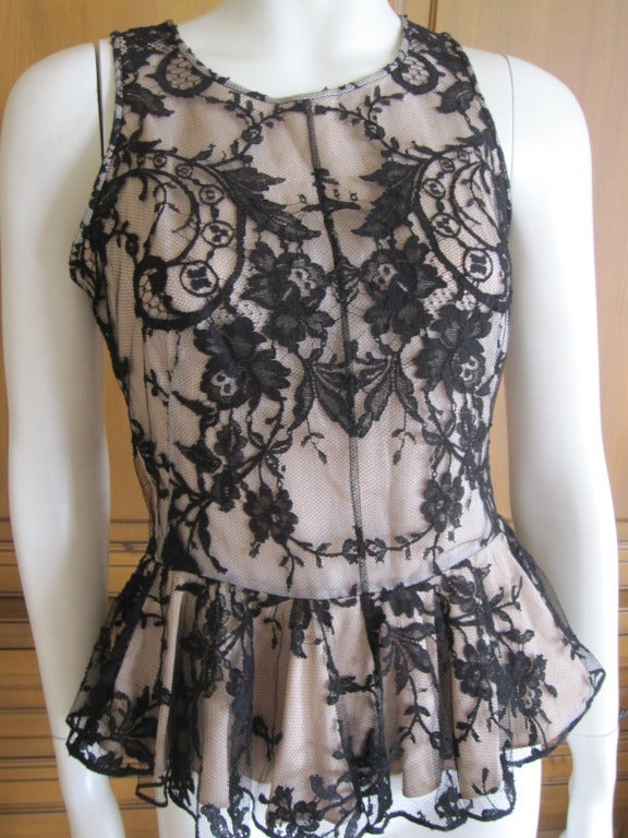 Alexander McQueen lace overlay sleeveless peplum top