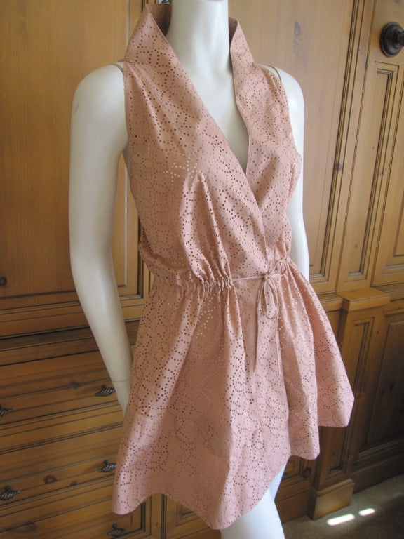 Azzedine Alaia lazer cut cotton minidress / tunic.
I would describe the color as a dusty rose
Sz 42
New with tags $4410