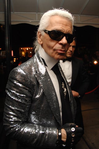 Chanel Mens Miami Paris  2009 sequin blazer.
I wear a sz 42 R in a blazer, and this is snug on me.
I would estimate it to be a 40 R