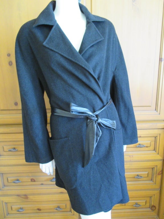 Hermes by Martin Margiela two piece pure cashmere ensemble.
Consisting of a unlined coat/dress with large front pockets, an over layer coat and a leather tie belt.
Pure Luxe, this is soft and chic.
