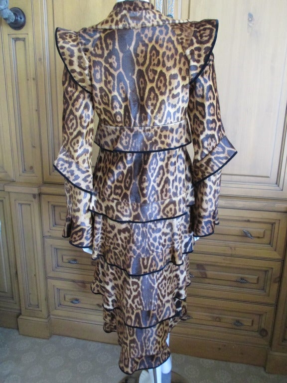 Tom Ford for YSL Fall 2004 ponyskin leopard print pagoda coat.
From Tom Ford's final YSL Collection which took inspiration from the orient of YSL's Opium era.
This is the iconic image from that collection, the leopard pagoda coat