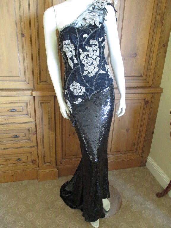 Azedeh Couture Sequin One Shoulder Evening Gown.
Custom gown embellished with black sequins and Swarovski crystals.
Azedeh is a San Francisco based custom dress designer, much beloved by society for her evening wear.
This is truly a stunning