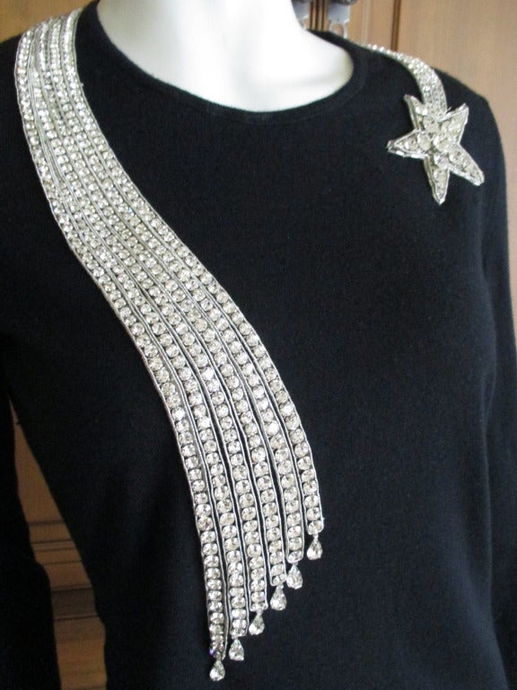 Beautiful evening sweater by Karl Lagerfeld for Chanel Fall 2003.
Magnificent Swarovski crystal jeweled 