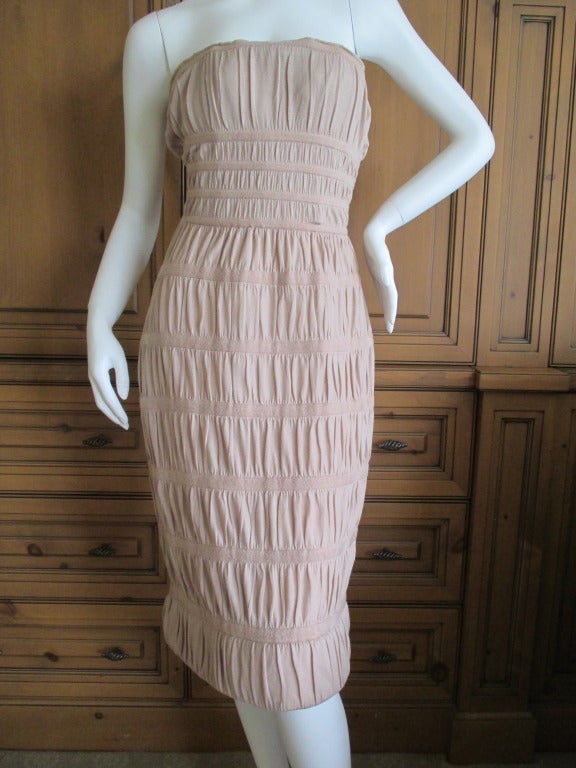 Azzedine Alaia Nude Silk Ruched Dress .
Designed with an inner corset and neck strap , I like it styled with out the neck strap.
So soft, feels like cashmere, but is listed as 100% silk on the tags
Lots of stretch, this is so much prettier in