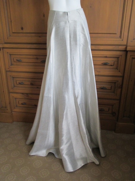 Ralph Rucci Chado Silver Ball Skirt.
Higher in the front , this is an unusual silver fabric that feels like raw silk, no fabric or size tag.
26