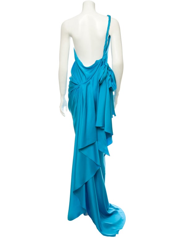 Yves Saint Laurent Blue Silk Dress
Sky blue one shoulder silk gown 
New with tags retail is $5250 
French 40