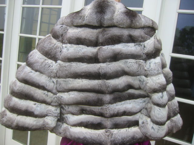 Super Luxurious Genuine Chinchilla Capelet.<br />
The label reads John Baldwin, but I'm not certain if that is the designer or the store it was purchased.<br />
It is a one size fit's all.There are arm holes, but no sleeve's, it is more a cape