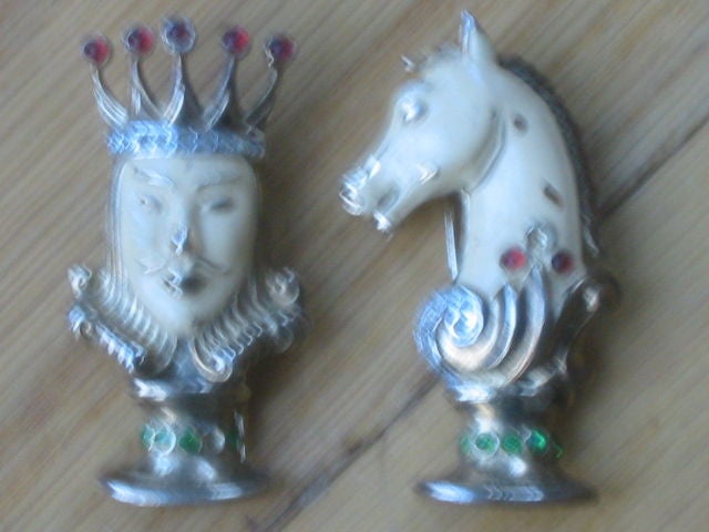 Designed in 1945 by Alfred Phillipe, these Sterling Vermeil Chess clips from Trifari are rare and collectable<br />
The enamel is slightly chiped on each piece, and there are a couple of stones missing.<br />
I can replace the stones if the buyer