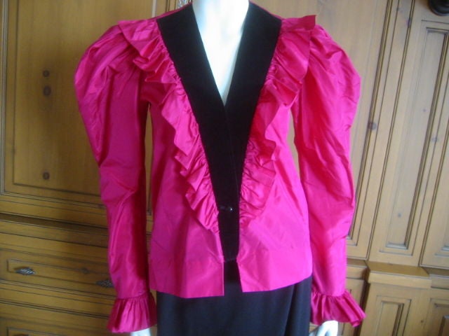 Yves Saint Laurent brilliant Fucia Silk ruffled blouse.<br />
From the era of the Russian collection.<br />
Velvet trim<br />
Sz 34<br />
Bust 35
