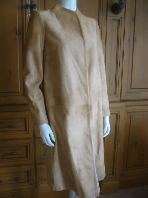 Exquisite crisply tailored Cowhide fur coat from Alexander McQueen.From the 1997 