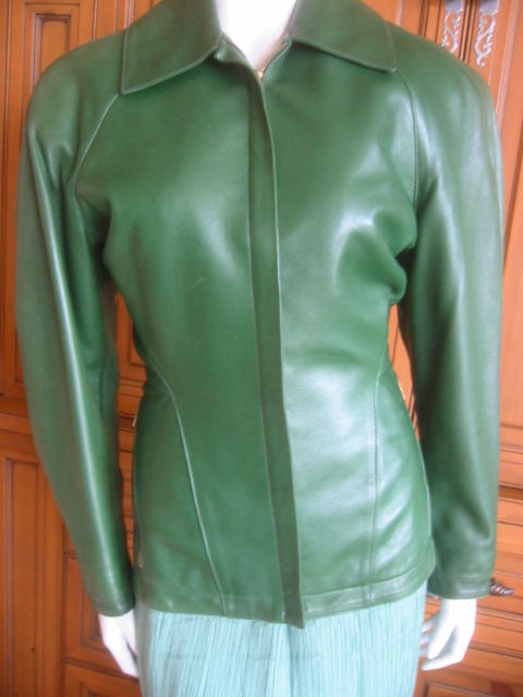 Azzedine Alaia Sculptural Green Leather Vintage Jacket.<br />
Razor cut in super soft lambskin, the details are pure Alaia.<br />
The back has a deep center seam, and stiched rump.<br />
Azzedine always gives good derriere.<br />
Sz 38 (4-6)<br