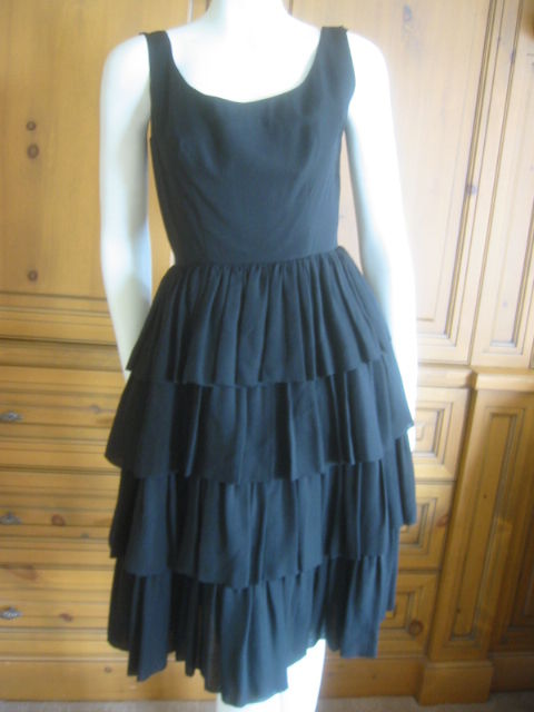 Rudi Gernreich Little Black Dress 1950's  for JAX by Walter Bass.<br />
Before his topless bathing suit catipulted him to fame during the mod 60's, this dress is from the 1950's.<br />
JAX was a trendy store in Los Angeles in the 50's<br />
<br