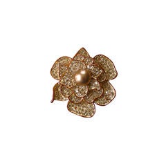 Large floal pin set in topaz