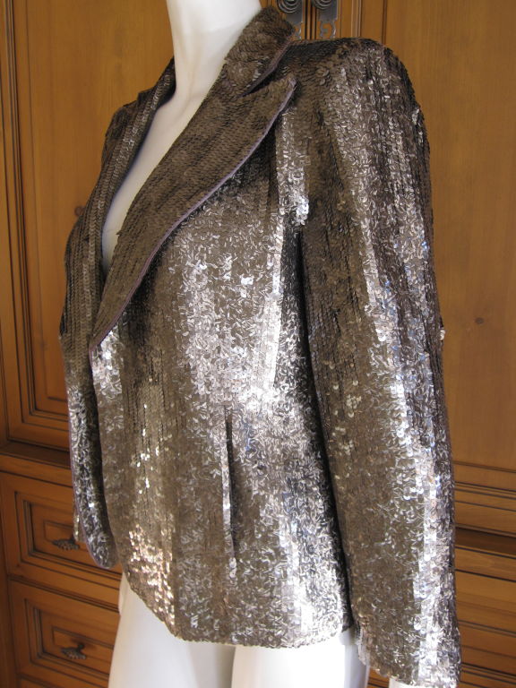 Dries van Noten sequin evening jacket.<br />
This is an exquisite piece, somewhere between  tarnished silver and gunmetal.<br />
Sz 38<br />
Bust 40