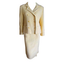 Coco Chanel- 1958 Gold lame and white sport jacket and skirt suit lined and  trimmed in blue over a blue silk blouse and t…