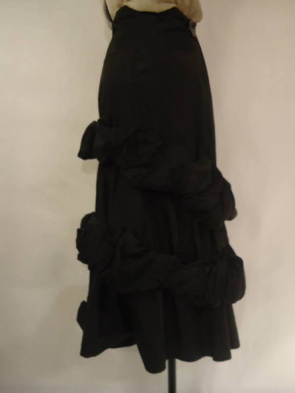 Grand soirée Galline Regine black full skirt.
The italian brand Preziosissimo Sangue by Galline Regine made a fantastic work with folds.

100 % silk.
Size 42 (It)

Made in Italy

Perfect conditions.

Fast international shipping included in