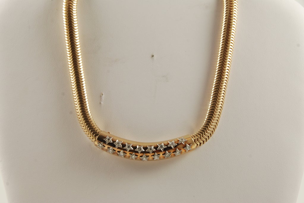 Heavy, 14k gold retro (1940's) snake chain necklace, center bar  has high quality diamonds set into white gold stars. Necklace is 16