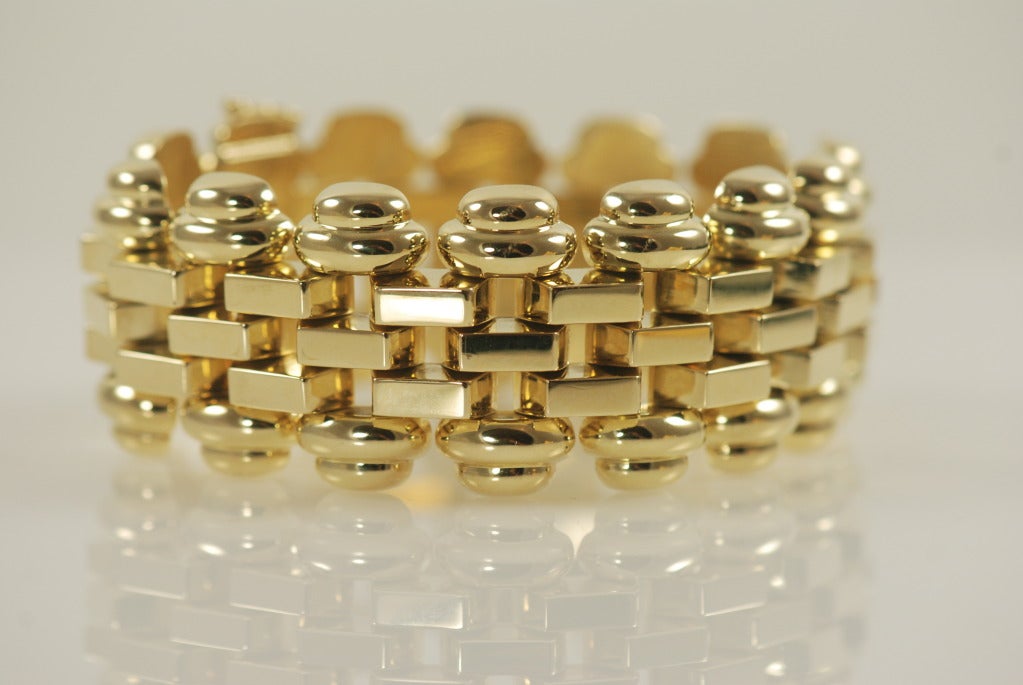 Wide 14k retro bracelet' flexible links. 1.13 inches wide, 7.25 inches long.