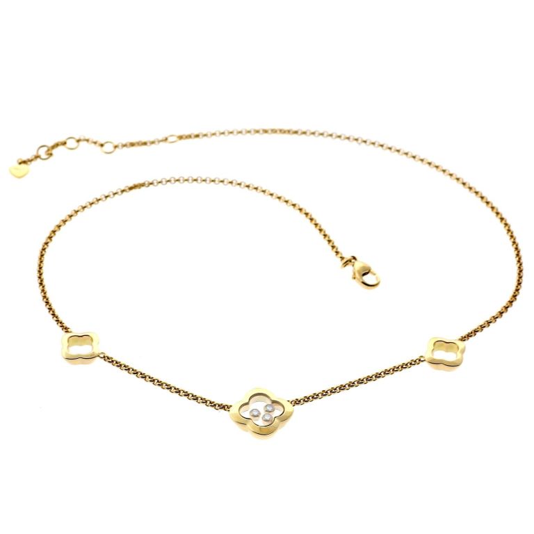 Chanel Happy Diamond necklace featuring 3 Quatrefoil motifs, the central motif featuring 3 Round Brilliant Cut VS1 E Color diamonds weighing .15ct. The necklace is crafted out of 18k Yellow Gold, and has a total weight of 15,9grams, with an
