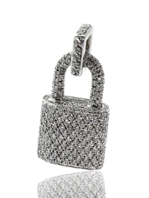 Magnificent Louis Vuitton Diamond Padlock charm pendant crafted in 18kt white gold, featuring 575 Vvs1 E Color Round Brilliant Cut Diamonds with a total weight of 10.32 carats.

